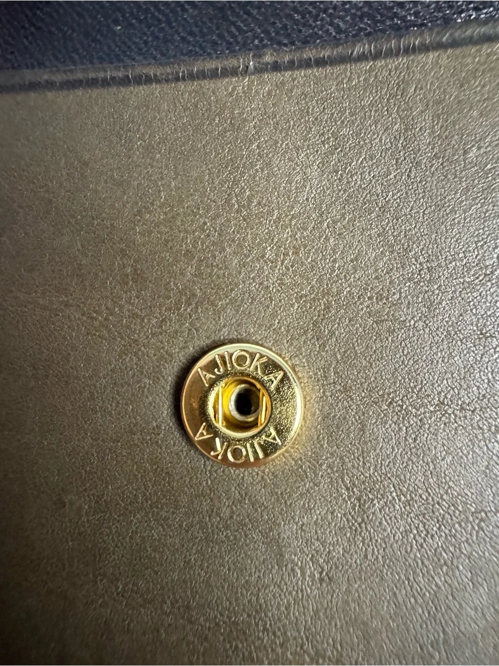 Yves Saint Laurent Gold Snap Detail on Olive Leather